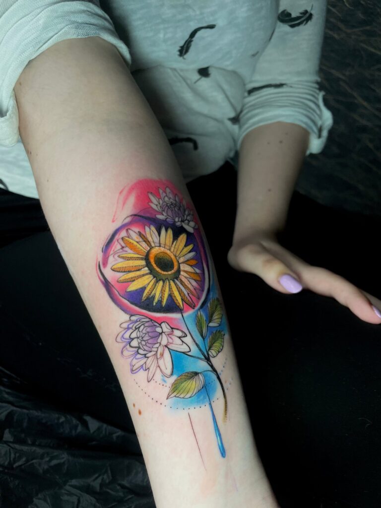 Farbiges Tattoo von Blackout Ink