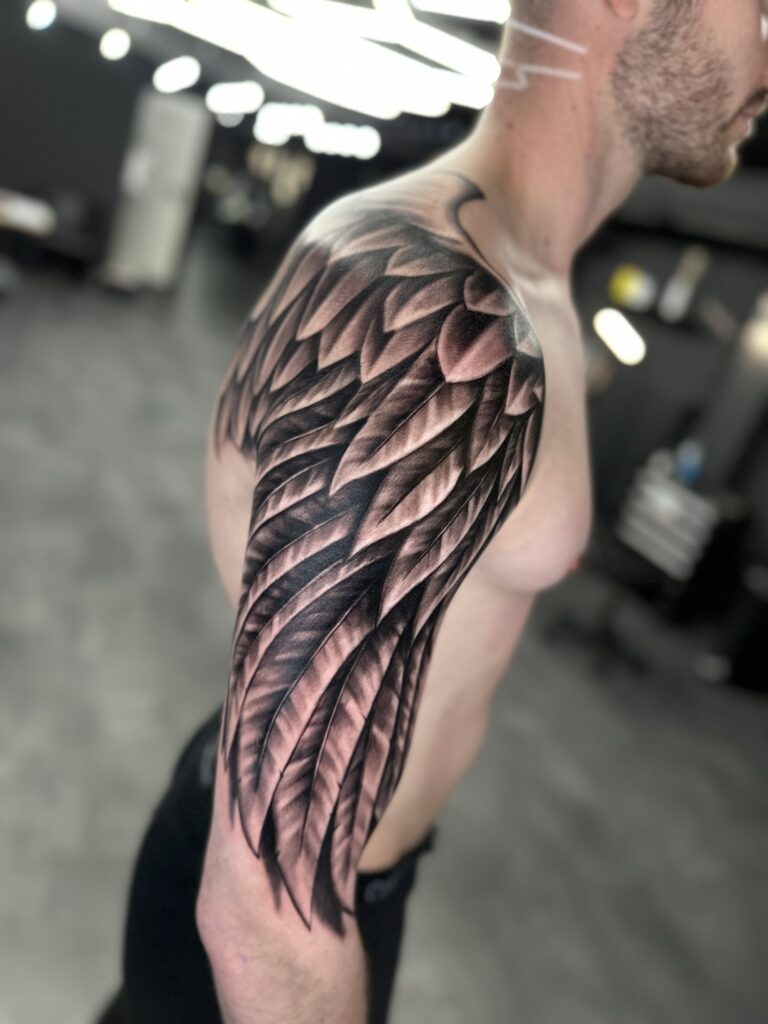 Realistisches Tattoo von Blackout Ink